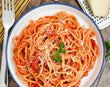 Masala Spaghetti with garlic and stewed tomato